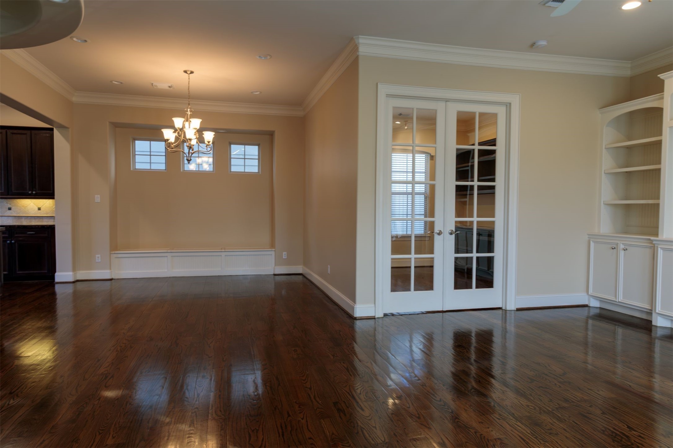 2101 Elmen Street Houston, TX 77019 - Photo 9 of 27 a view of a room with wooden floors and windows