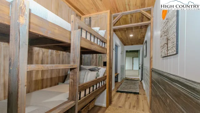 a view of balcony with wooden floor