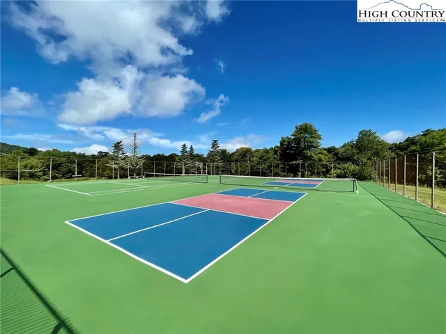 a view of a golf course with a park