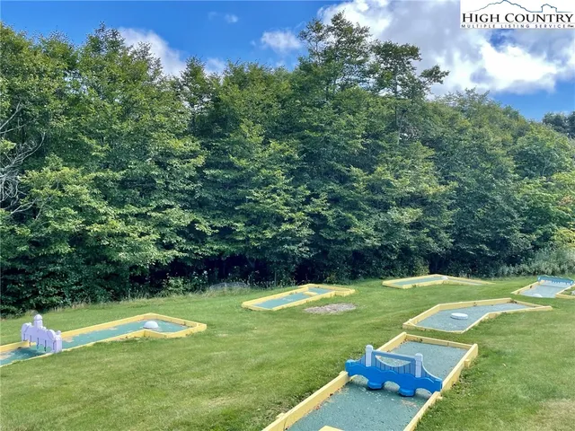 a view of a golf course with a yard