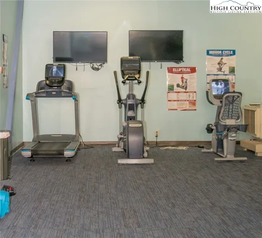 a view of a patio with furniture and yard