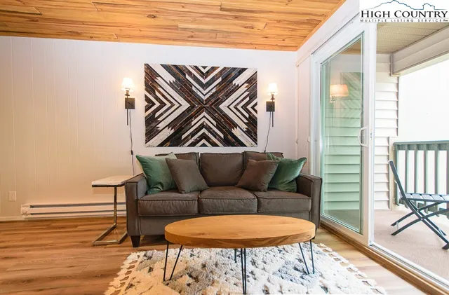 a blue chair sitting next to a blue wall