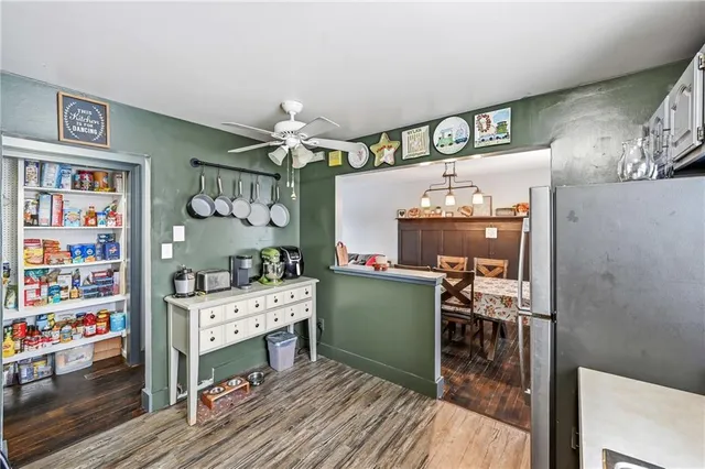 a room with furniture and wooden floor