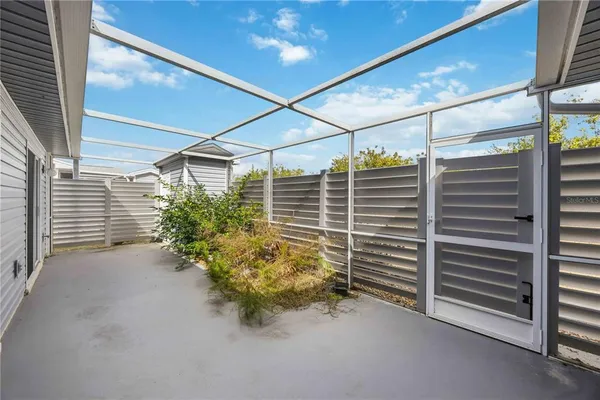 a view of an empty room with a garage