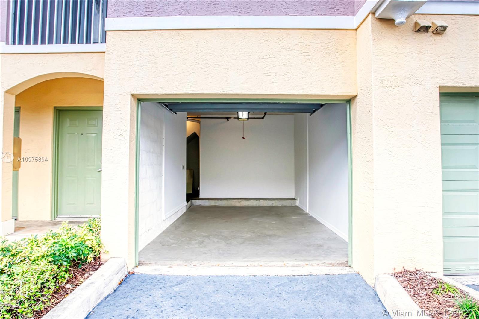 6400 West Sample Road, Unit 6400 Coral Springs, FL 33067 - Photo 2 of 23 Garage