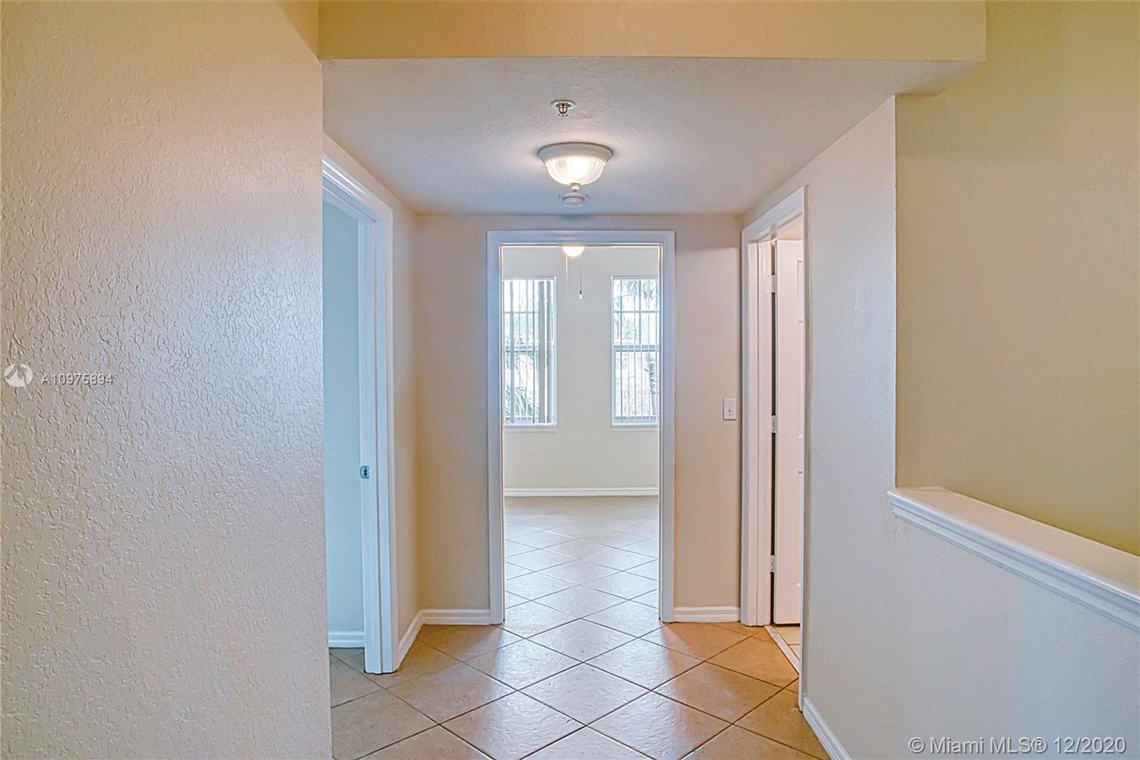 6400 West Sample Road, Unit 6400 Coral Springs, FL 33067 - Photo 11 of 23 3rd floor hallway.