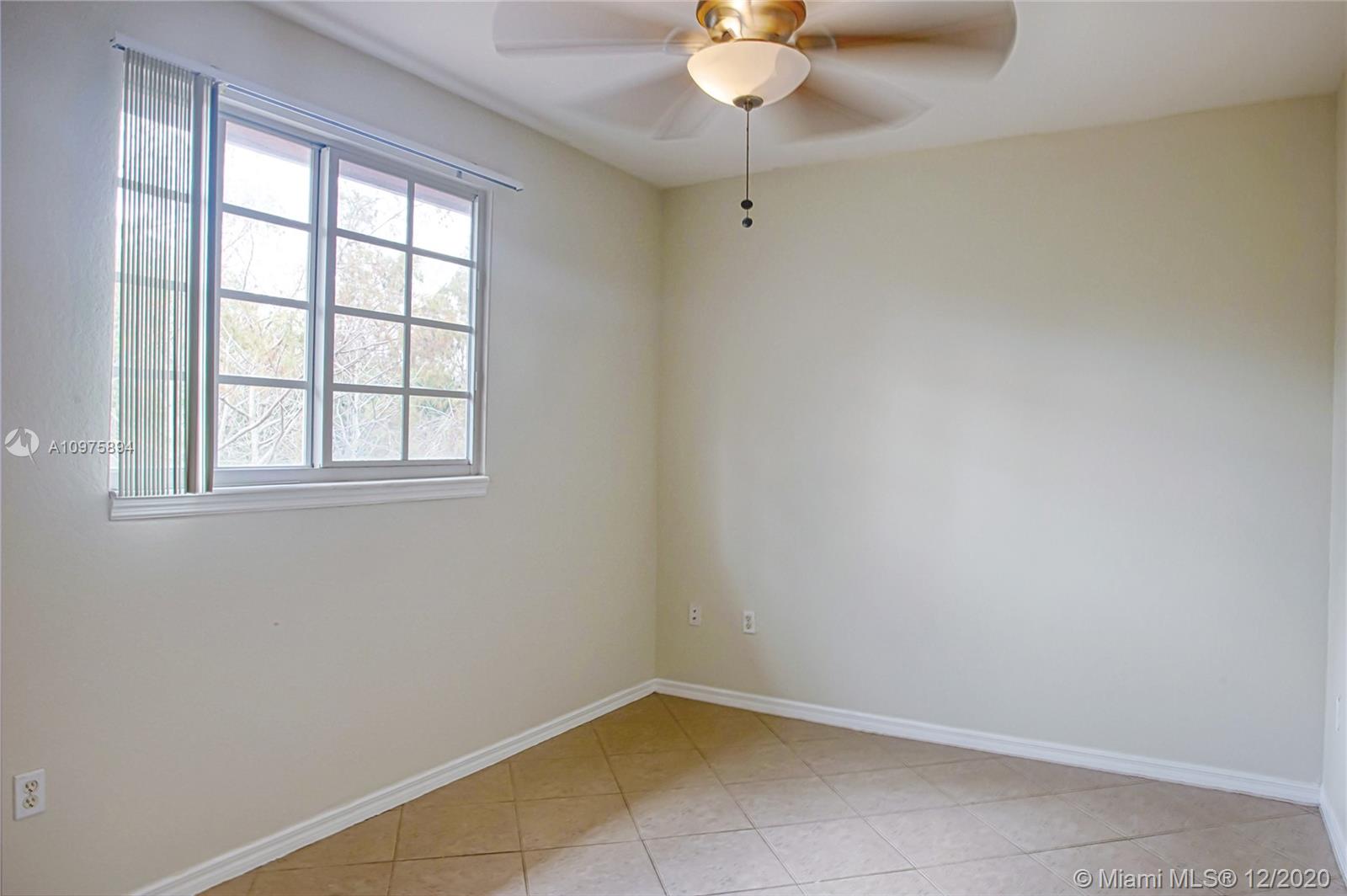 6400 West Sample Road, Unit 6400 Coral Springs, FL 33067 - Photo 12 of 23 Bedroom 1.