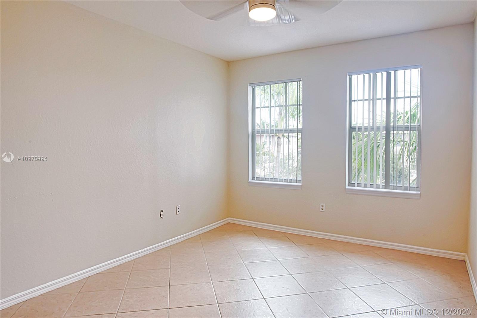 6400 West Sample Road, Unit 6400 Coral Springs, FL 33067 - Photo 16 of 23 Master bedroom.
