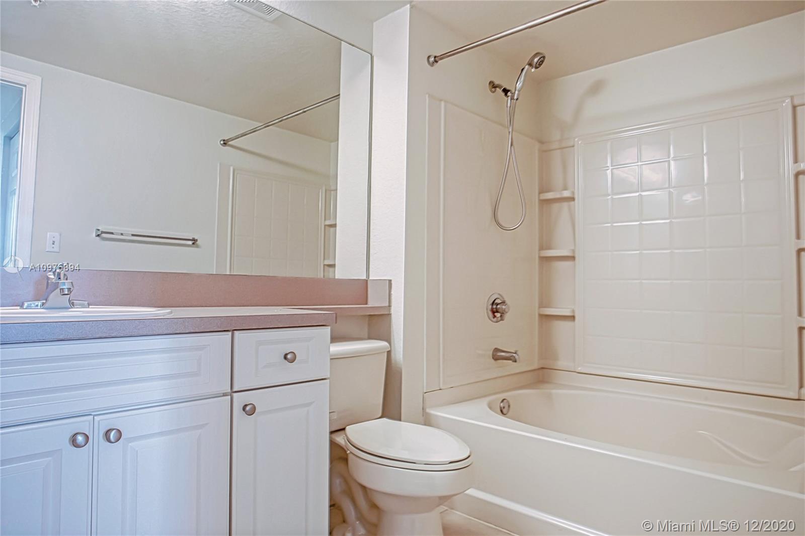 6400 West Sample Road, Unit 6400 Coral Springs, FL 33067 - Photo 18 of 23 Master bathroom: bath.