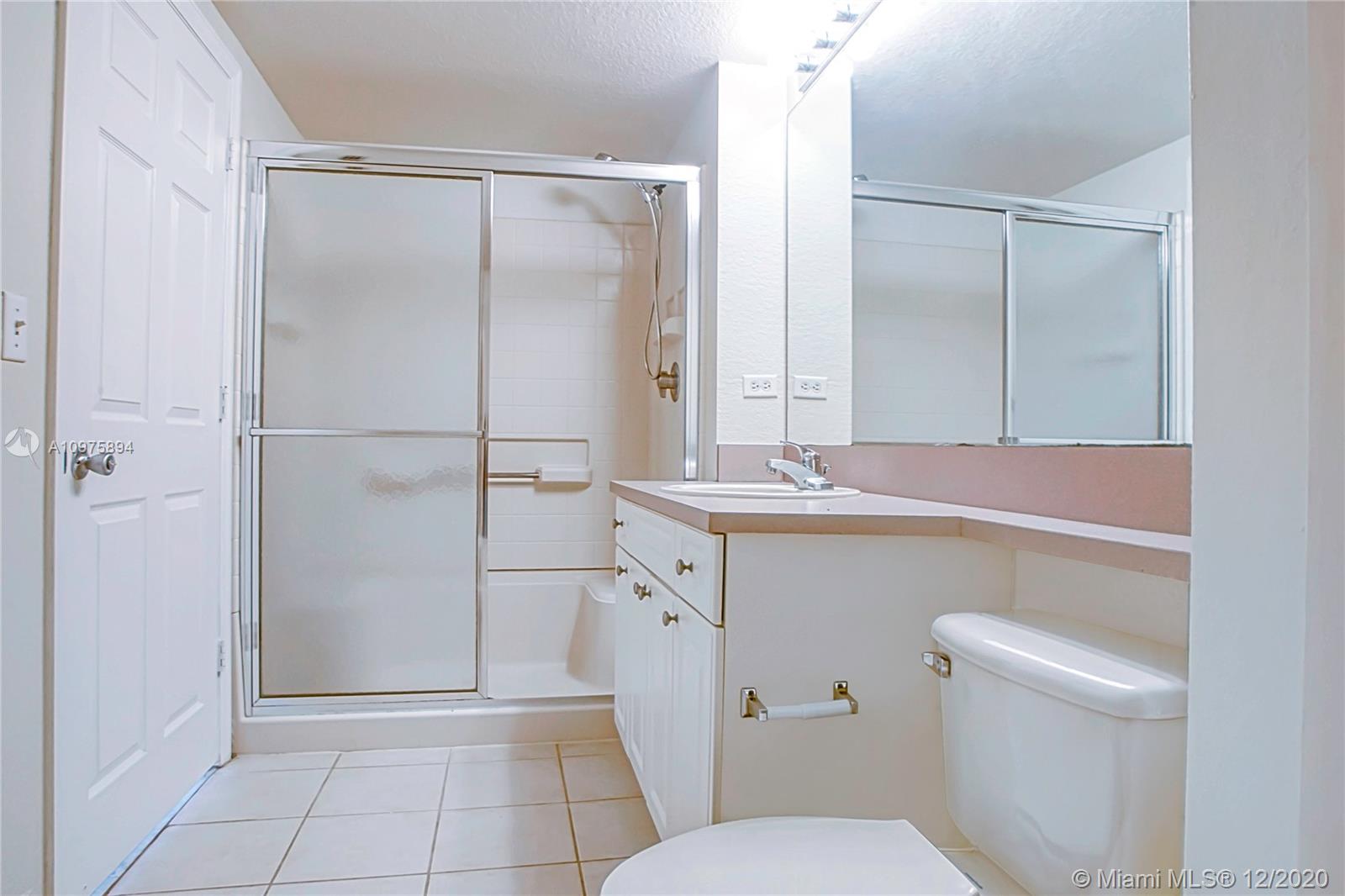 6400 West Sample Road, Unit 6400 Coral Springs, FL 33067 - Photo 19 of 23 Master bathroom: shower.