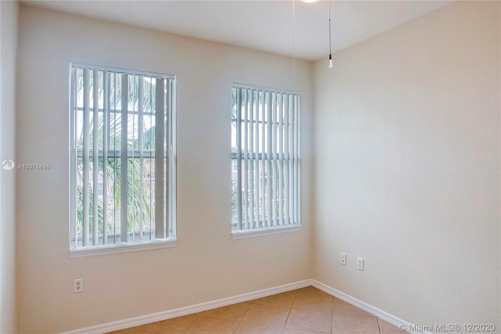 6400 West Sample Road, Unit 6400 Coral Springs, FL 33067 - Photo 20 of 23 Bedroom 2.
