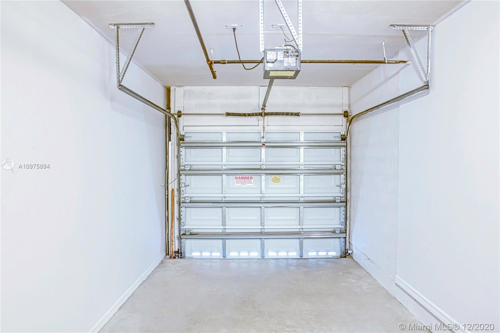 6400 West Sample Road, Unit 6400 Coral Springs, FL 33067 - Photo 3 of 23 Garage