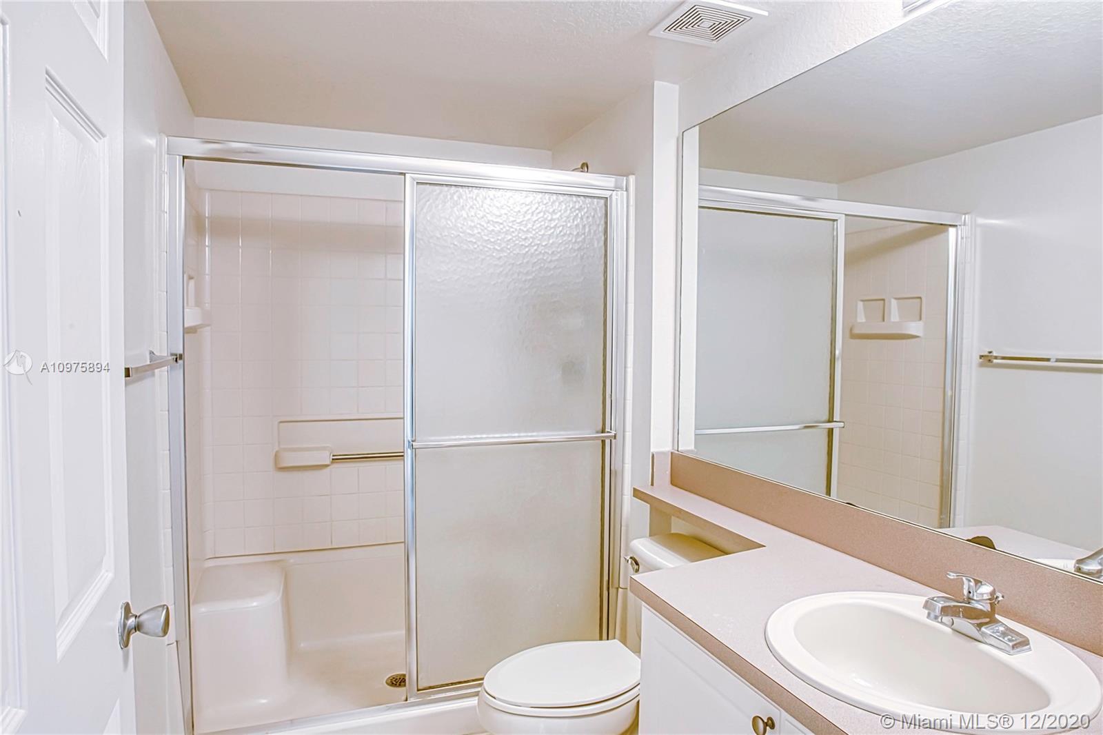 6400 West Sample Road, Unit 6400 Coral Springs, FL 33067 - Photo 22 of 23 Bathroom for Bedroom 1 and 2.