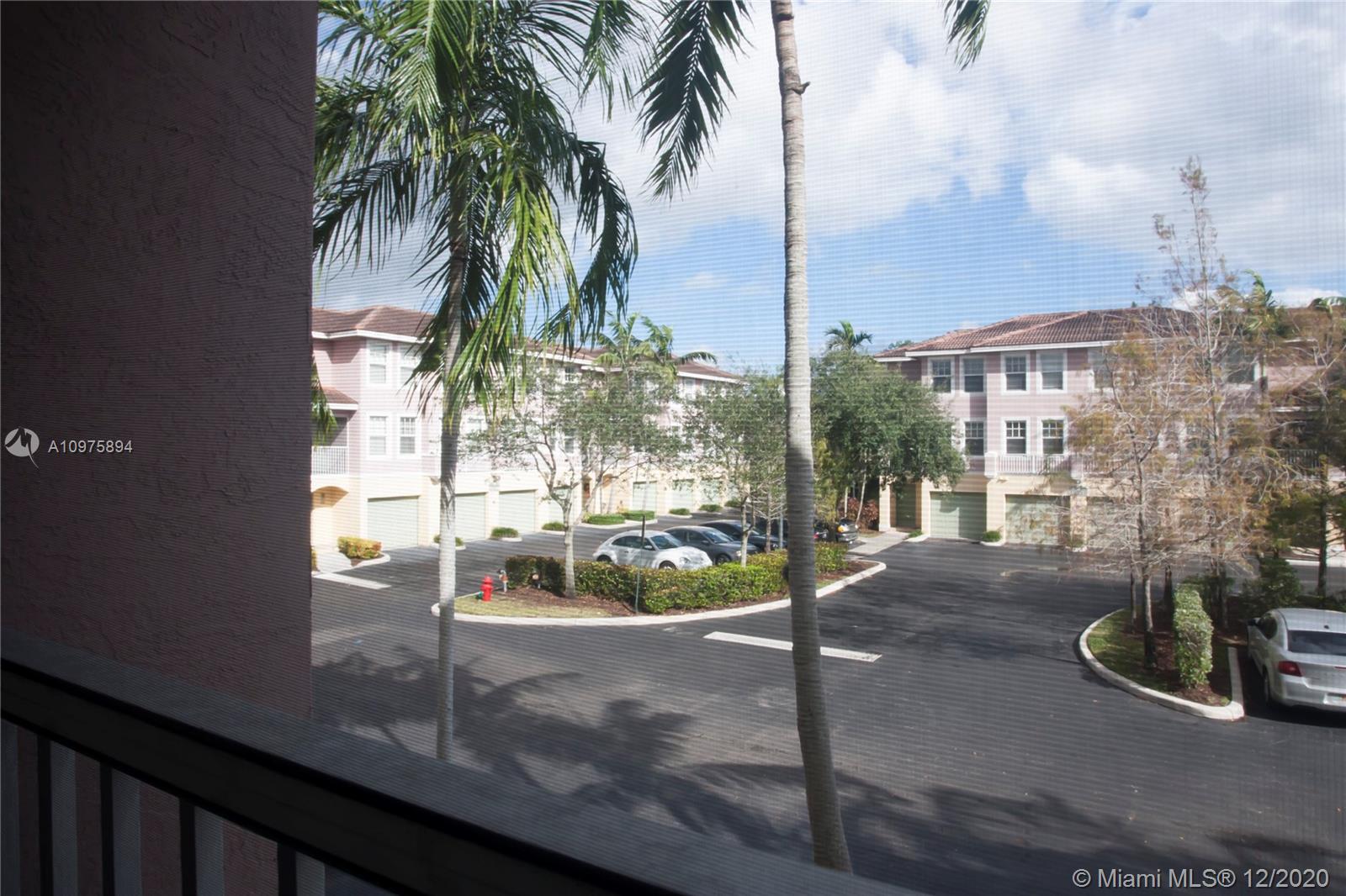 6400 West Sample Road, Unit 6400 Coral Springs, FL 33067 - Photo 23 of 23 Balcony at the living room.