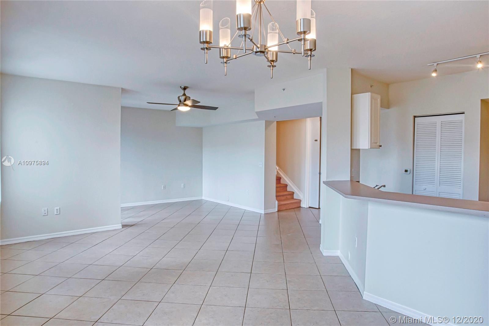 6400 West Sample Road, Unit 6400 Coral Springs, FL 33067 - Photo 6 of 23 Living room.