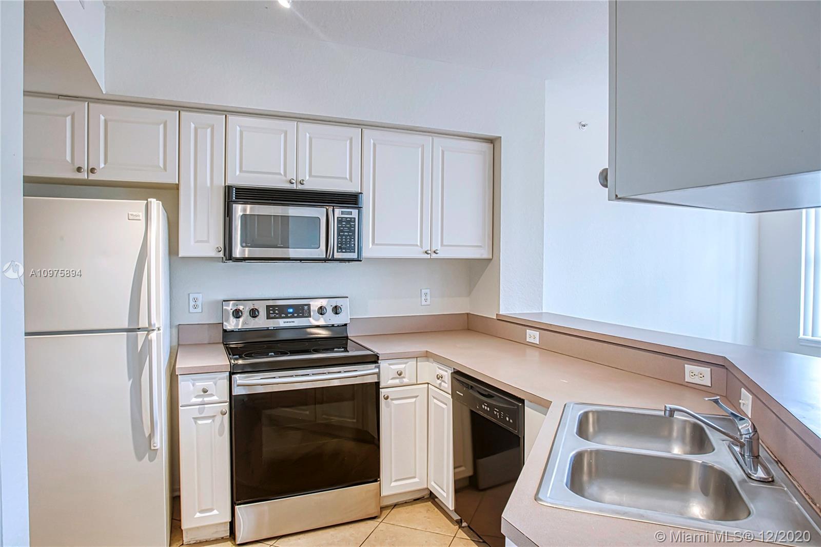 6400 West Sample Road, Unit 6400 Coral Springs, FL 33067 - Photo 8 of 23 Kitchen.