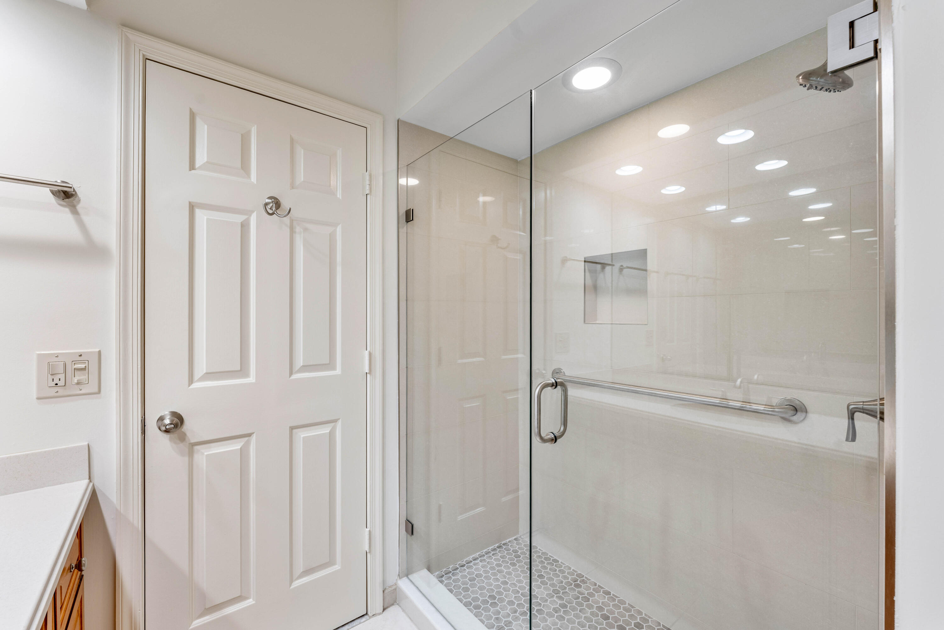 1851 Thatch Palm Drive Boca Raton, FL 33432 - Photo 43 of 70 a bathroom with a shower