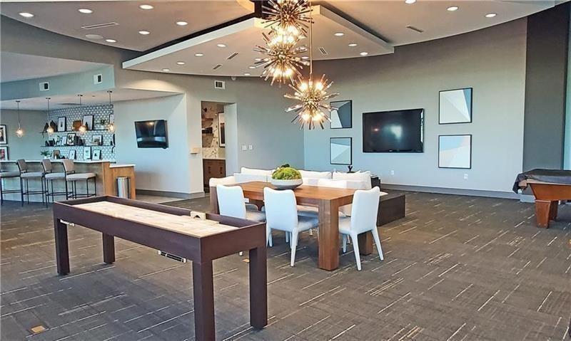 250 Pharr Road Northeast, Unit 308 Atlanta, GA 30305 - Photo 26 of 35 a view of a dining room with furniture