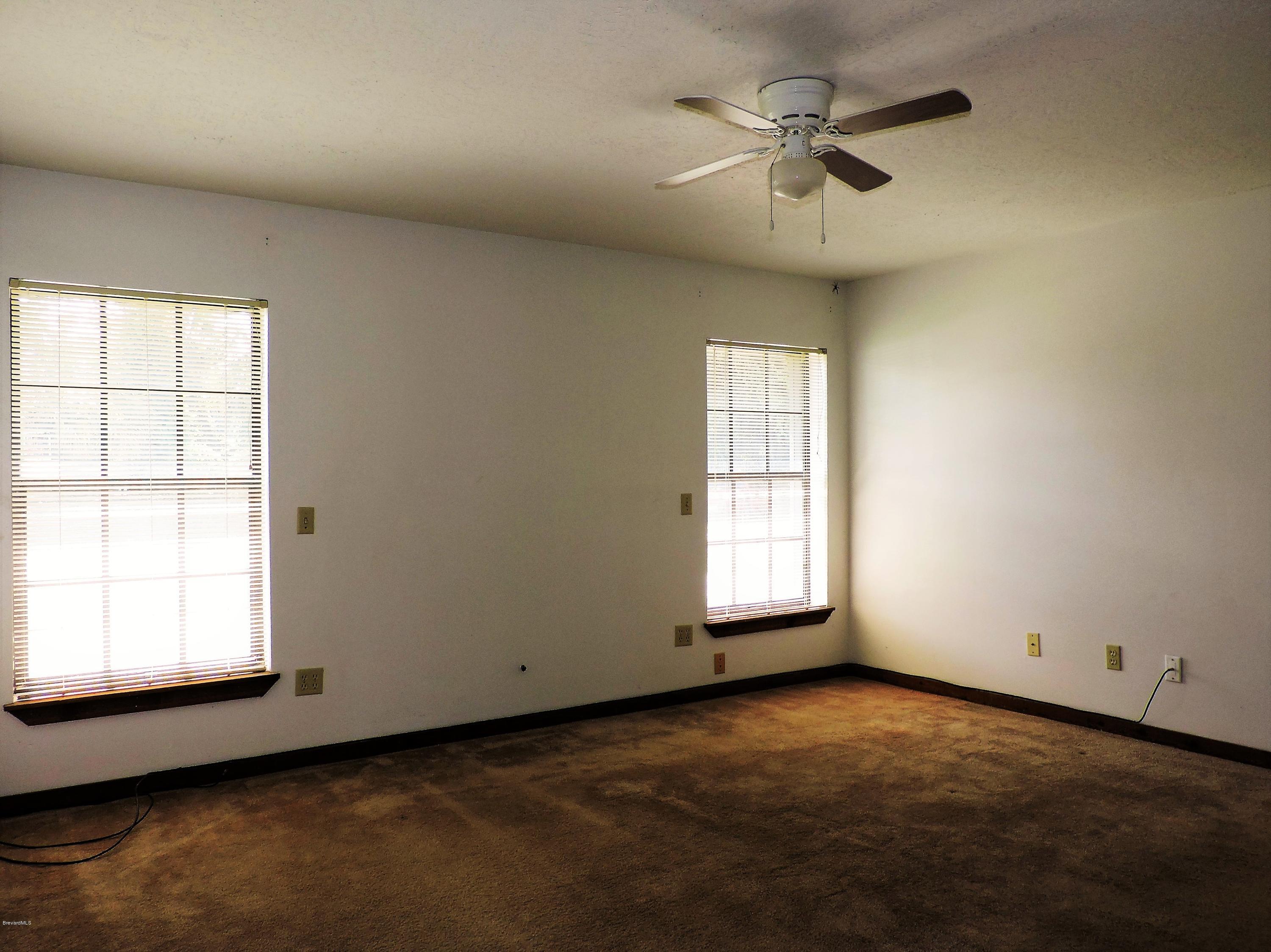 6990 Bismark Road Cocoa, FL 32927 - Photo 7 of 14 Master Bedroom