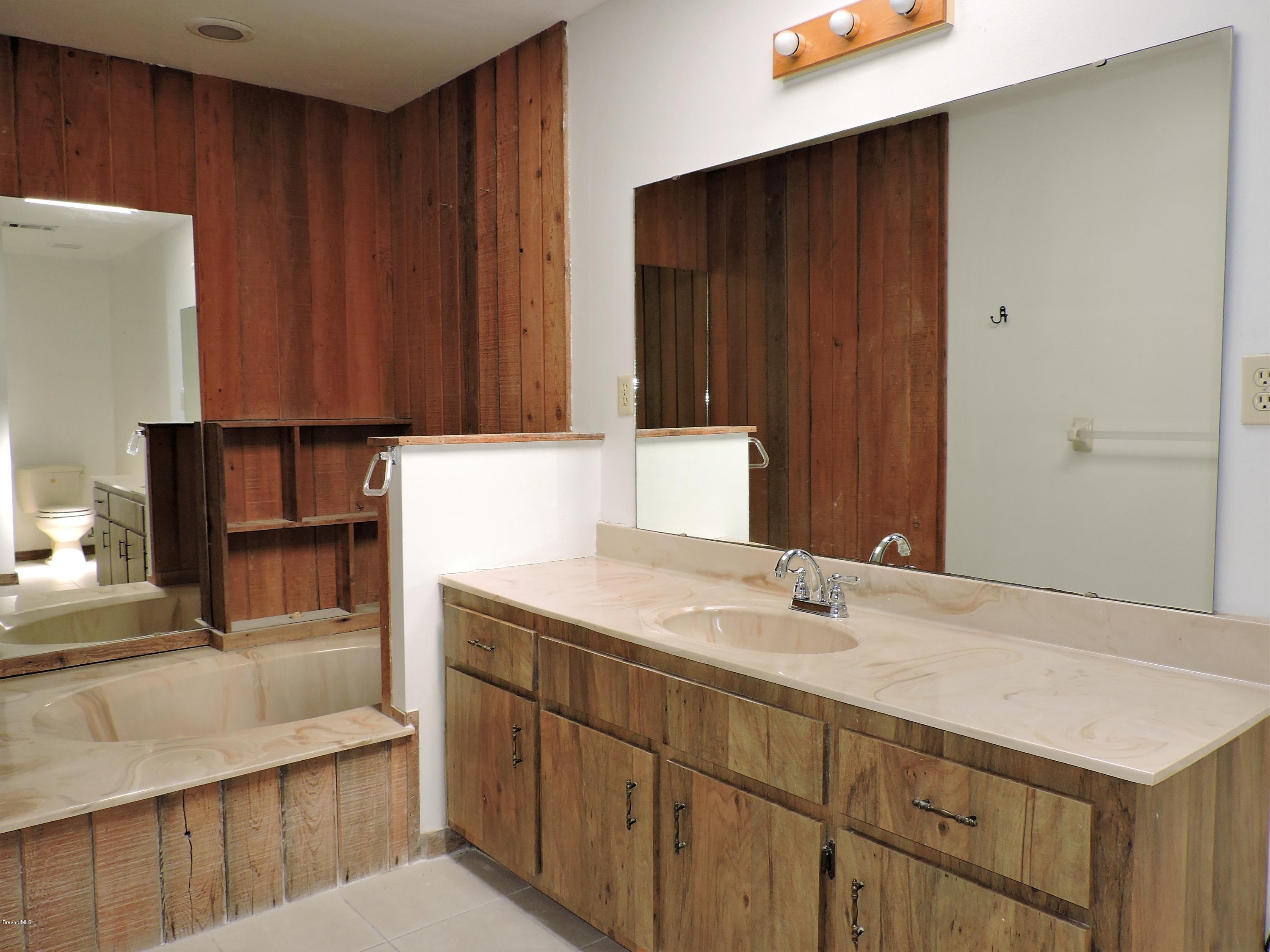 6990 Bismark Road Cocoa, FL 32927 - Photo 8 of 14 Master Bathroom