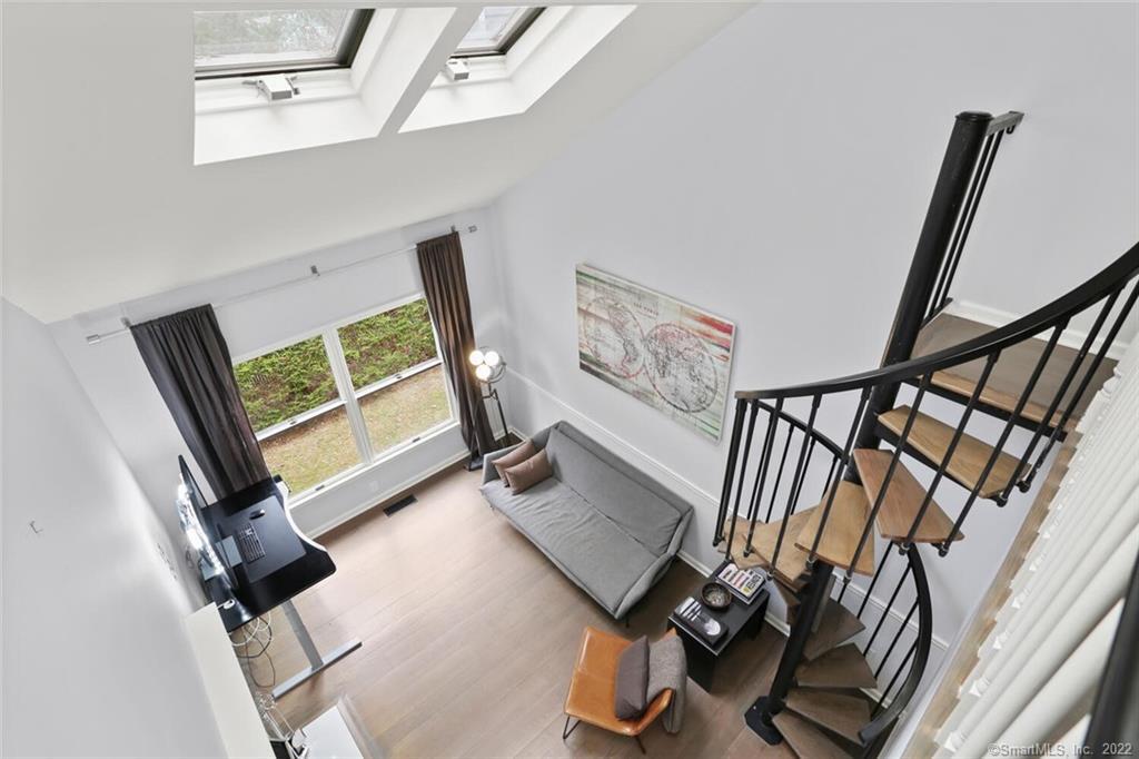 13 Old Stamford Road, Unit 13 New Canaan, CT 06840 - Photo 15 of 39 a view of an entryway with wooden floor