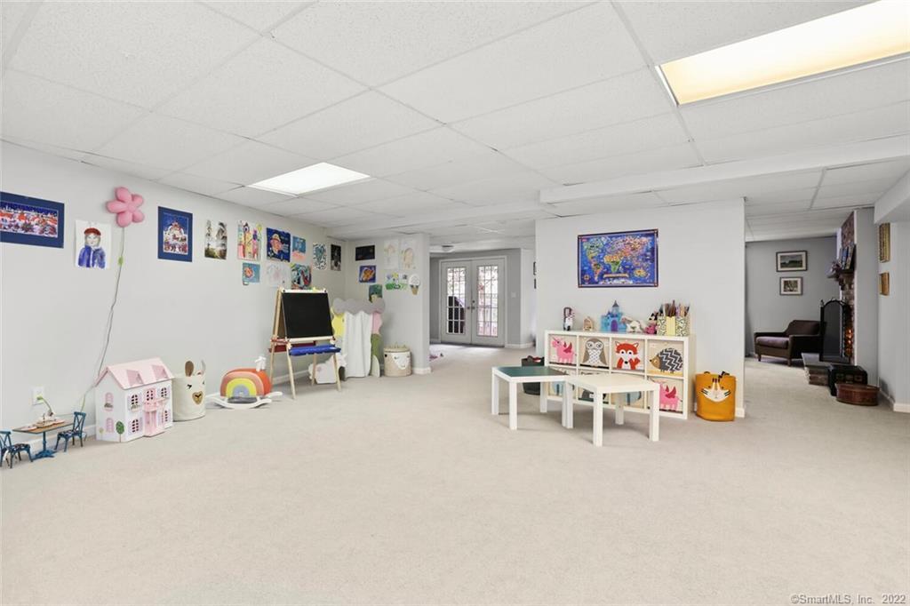 13 Old Stamford Road, Unit 13 New Canaan, CT 06840 - Photo 27 of 39 a view of a play room with gym equipment