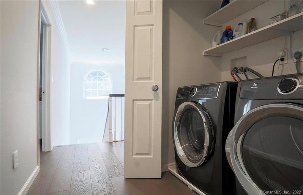 13 Old Stamford Road, Unit 13 New Canaan, CT 06840 - Photo 34 of 39 a utility room with dryer and washer