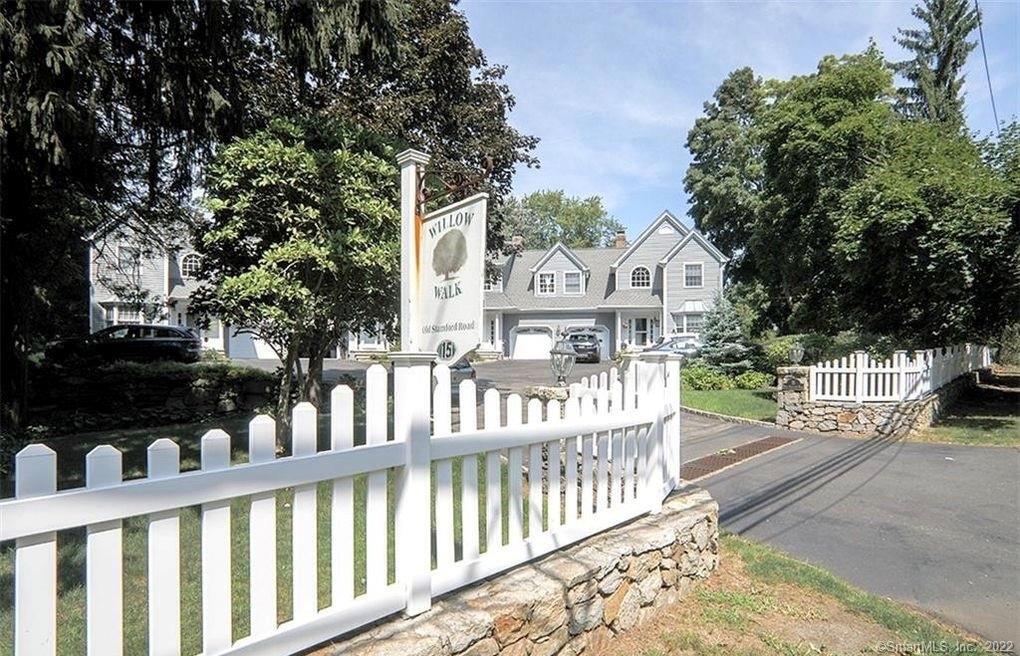 13 Old Stamford Road, Unit 13 New Canaan, CT 06840 - Photo 35 of 39 a view of a street with houses