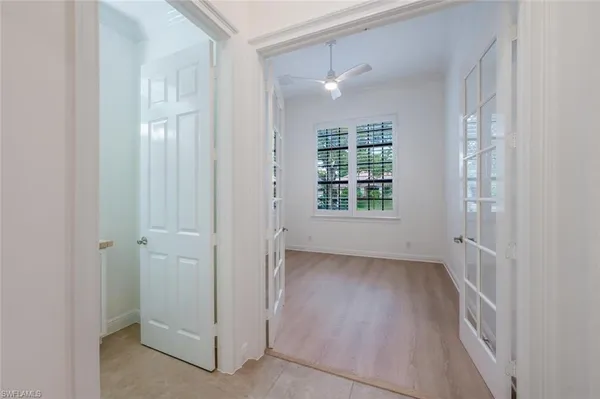 an empty room with windows