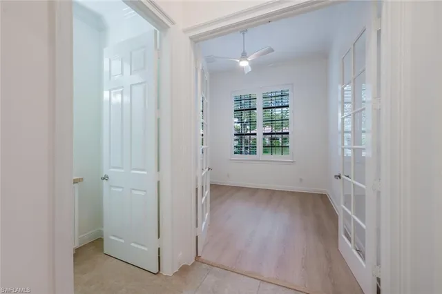 an empty room with windows