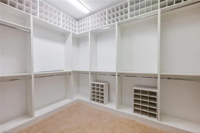 a view of an empty walk in closet
