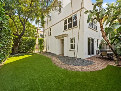 a view of a backyard of the house