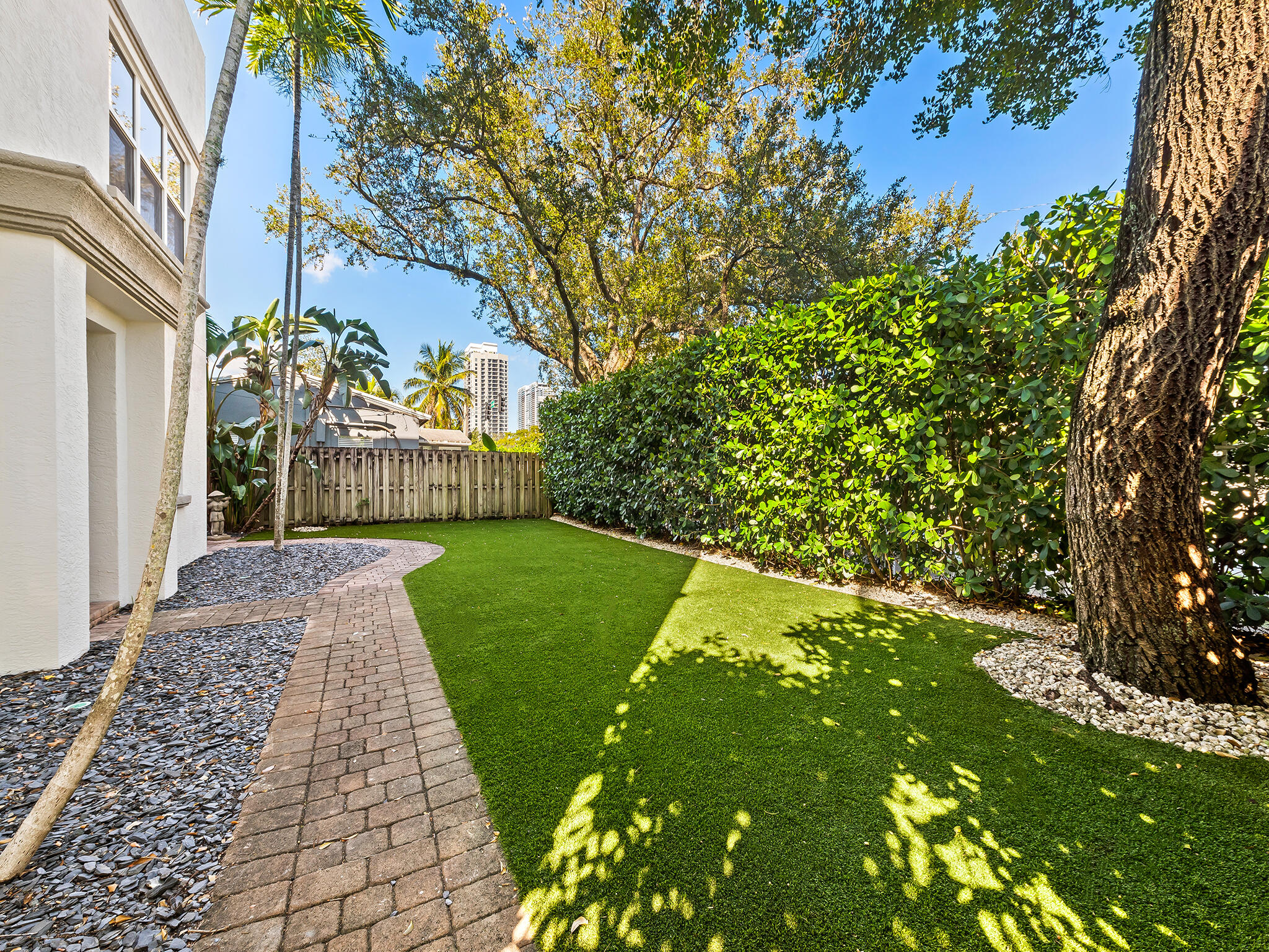 705 Southwest 4th Avenue Fort Lauderdale, FL 33315 - Photo 19 of 25 a view of a yard with plants and trees