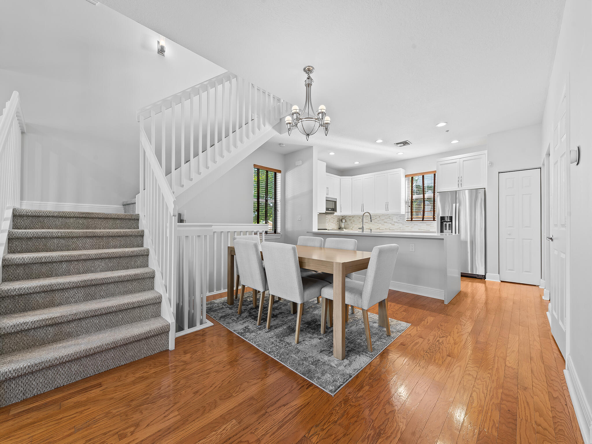 705 Southwest 4th Avenue Fort Lauderdale, FL 33315 - Photo 5 of 25 a view of a dining room with furniture and wooden floor