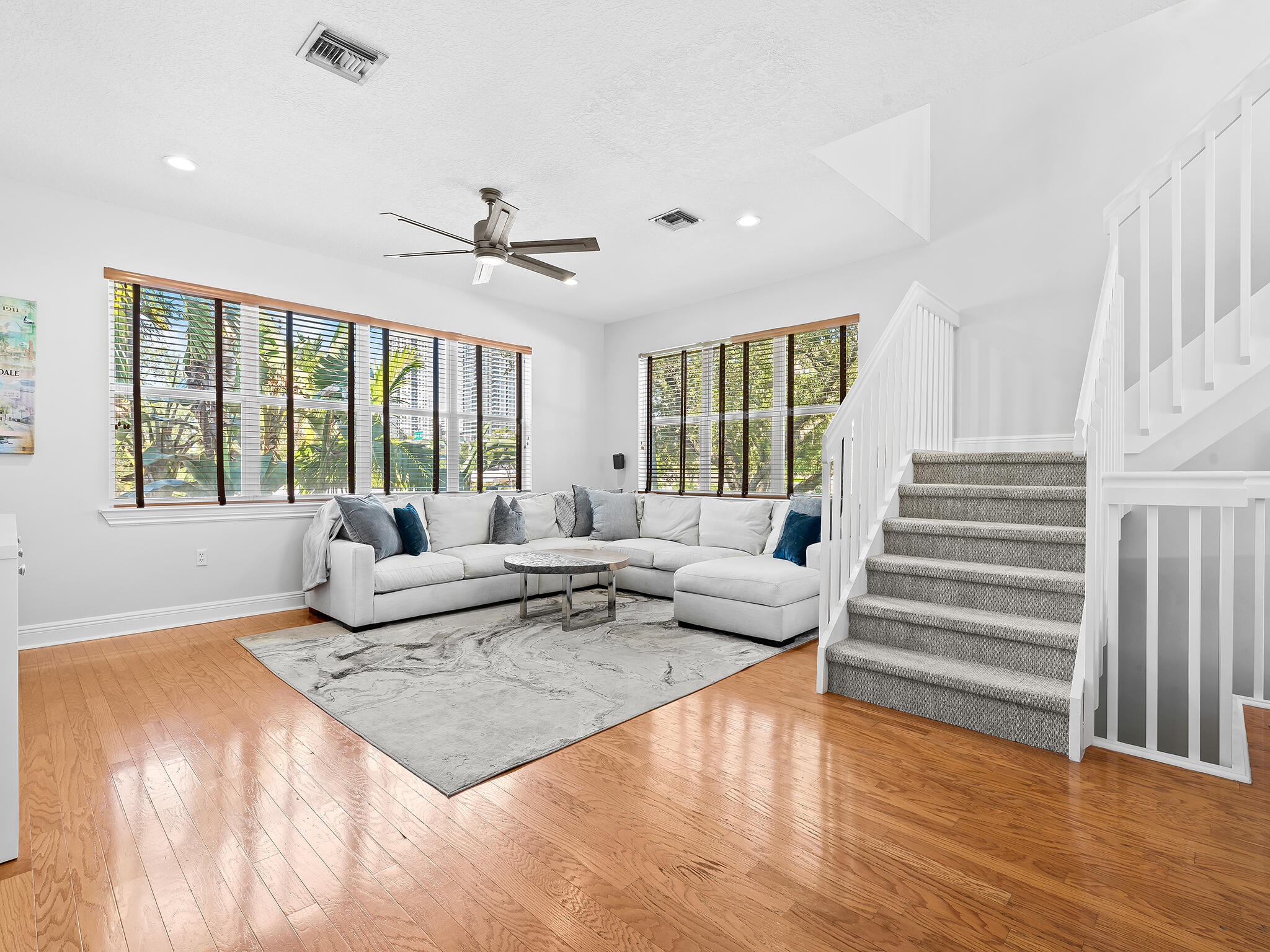 705 Southwest 4th Avenue Fort Lauderdale, FL 33315 - Photo 9 of 25 a living room with furniture and a large window