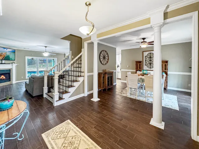 a view of a livingroom with furniture and wooden floor