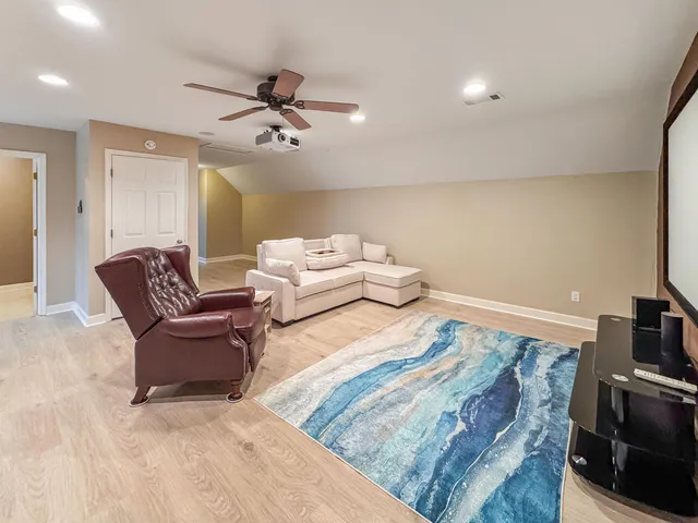 a bedroom with a bed and furniture