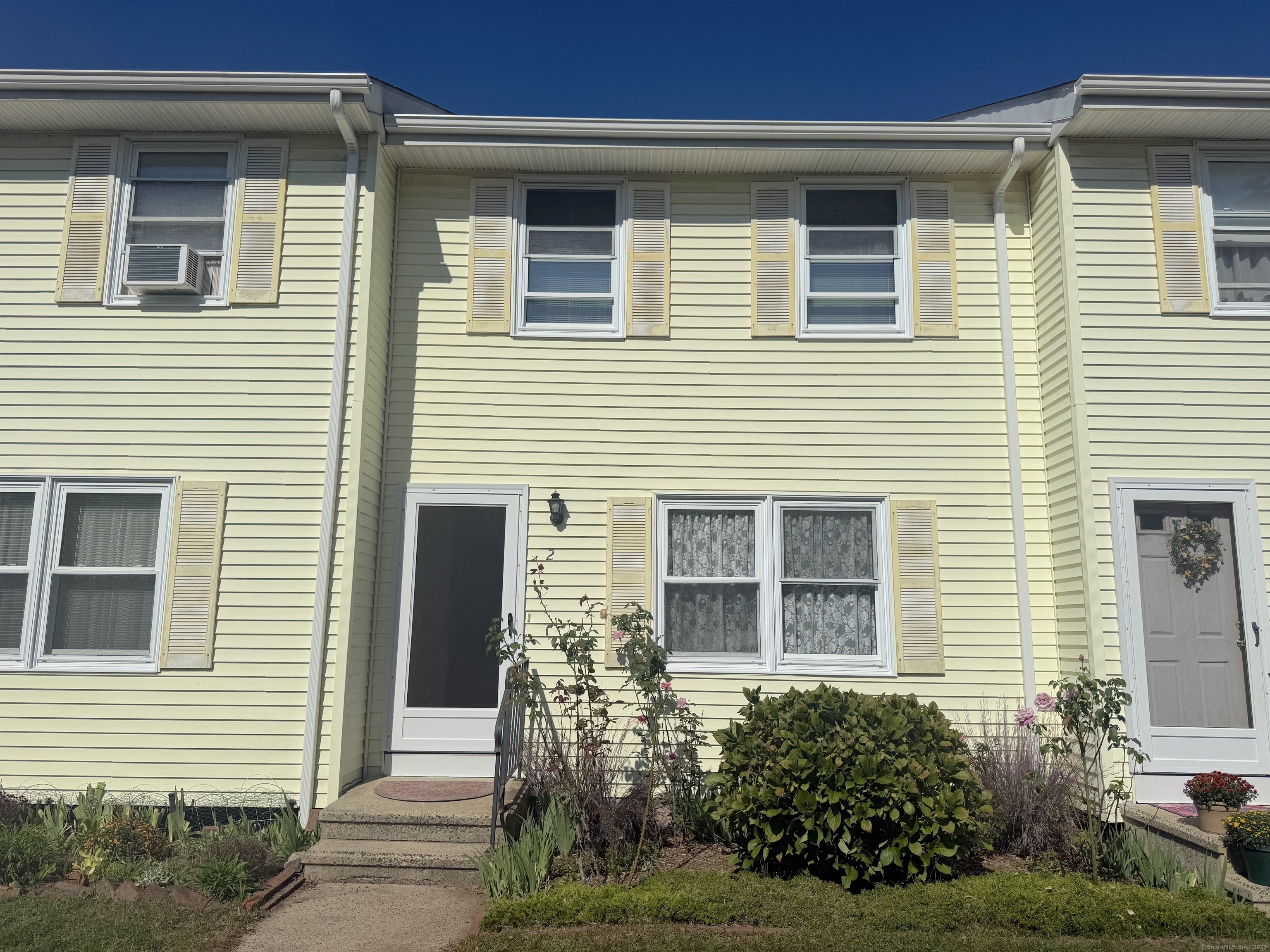 87 Gerrish Avenue, Unit T2 East Haven, CT 06512 - Photo 12 of 12 a front view of a house