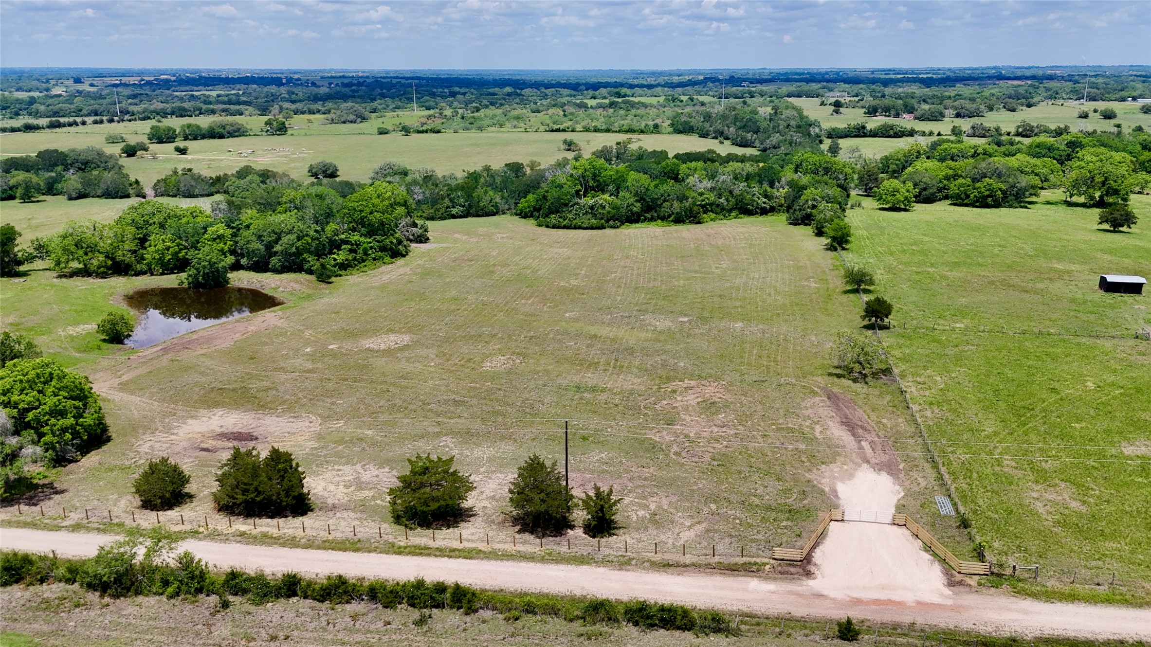 1049 Muehr Road Weimar, TX 78962 - Photo 3 of 24 a view of a garden with an outdoor space