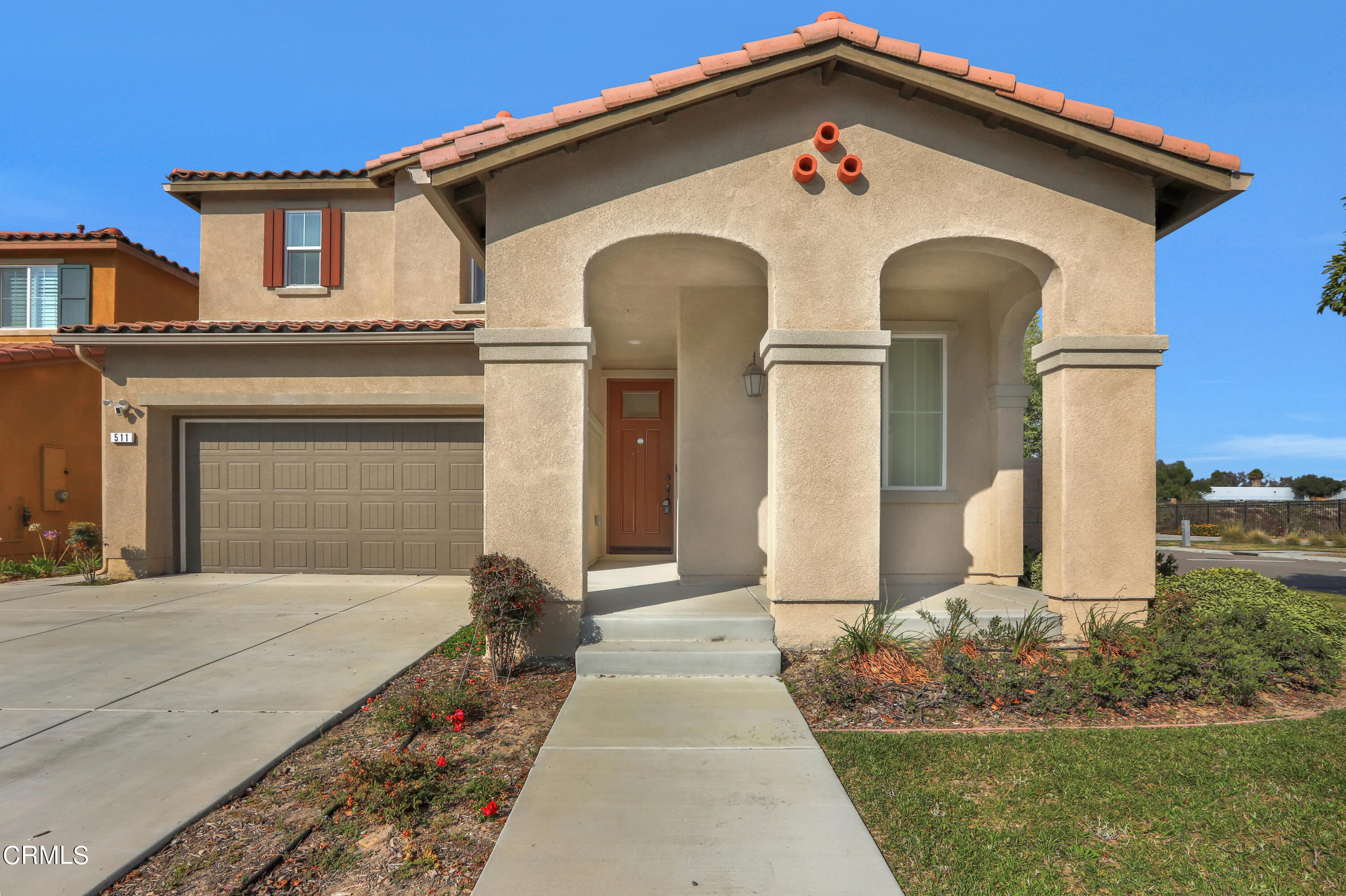 511 Whalen Way Oxnard, CA 93036 - Photo 1 of 28 a front view of a house with garden