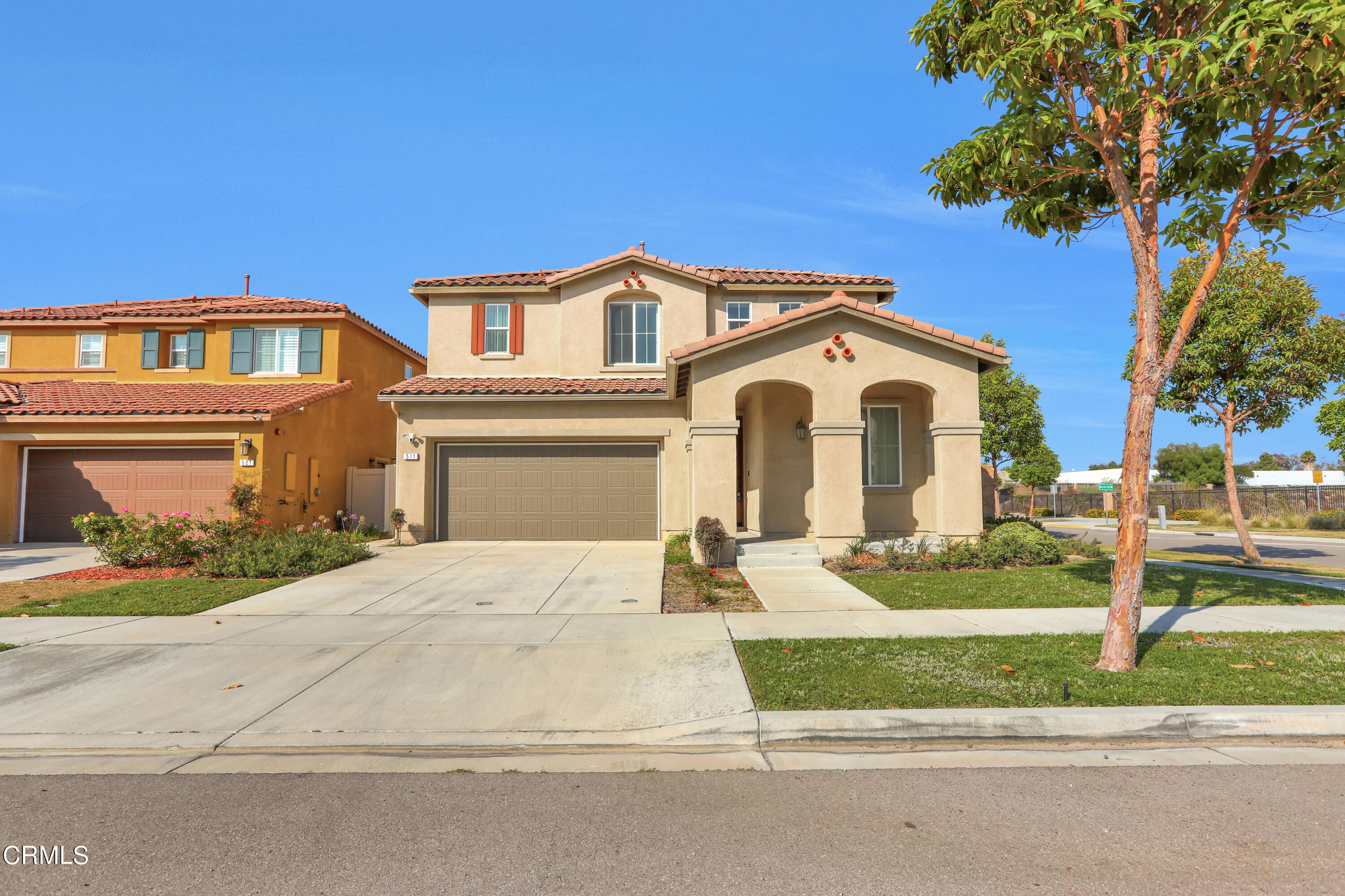 511 Whalen Way Oxnard, CA 93036 - Photo 2 of 28 a front view of a house with a yard