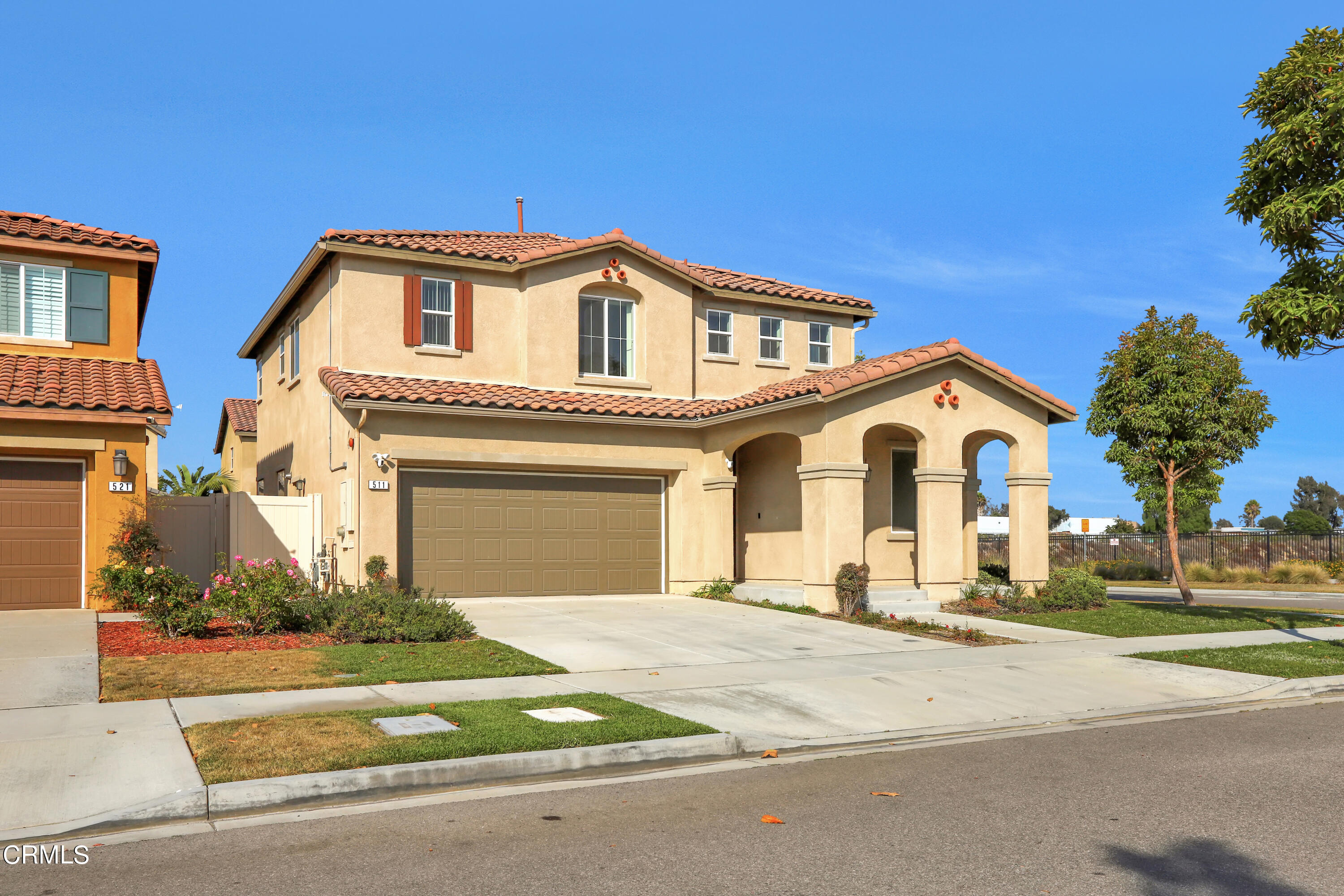 511 Whalen Way Oxnard, CA 93036 - Photo 4 of 28 a front view of a house with a yard