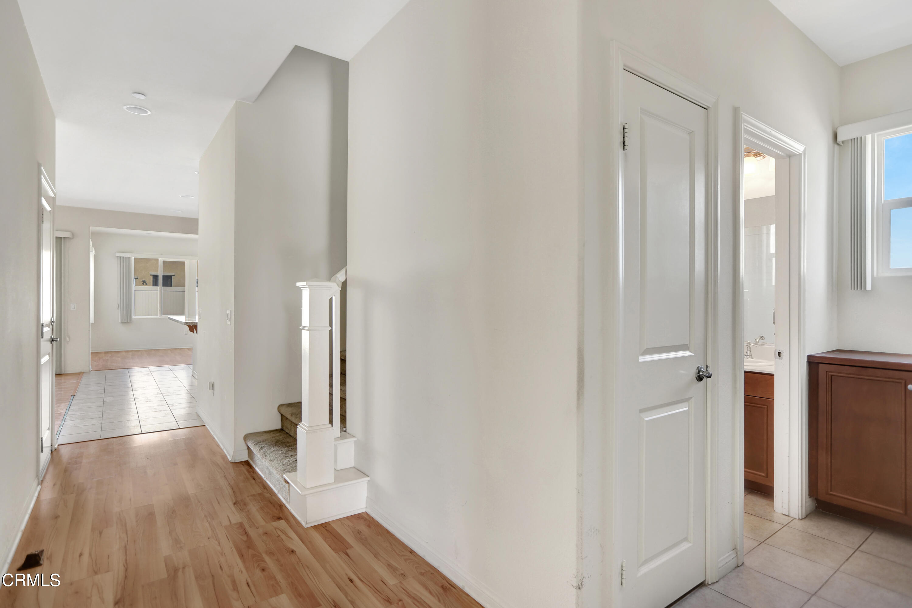 511 Whalen Way Oxnard, CA 93036 - Photo 5 of 28 a view of a hallway with wooden floor