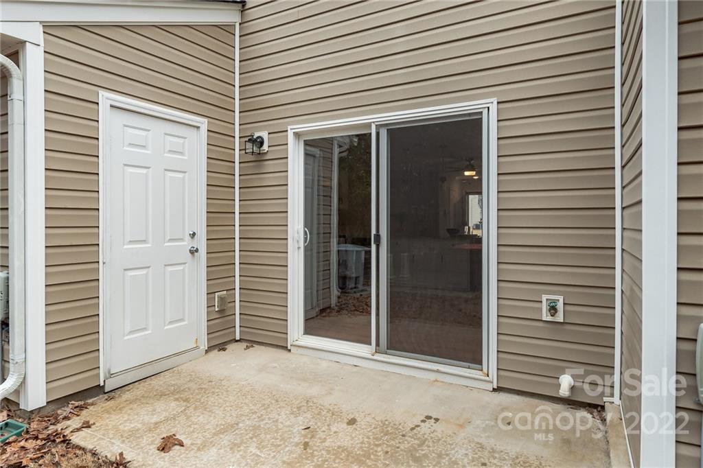 433 Hunters Dance Road Fort Mill, SC 29708 - Photo 20 of 25 a view of a porch with a door and a large window