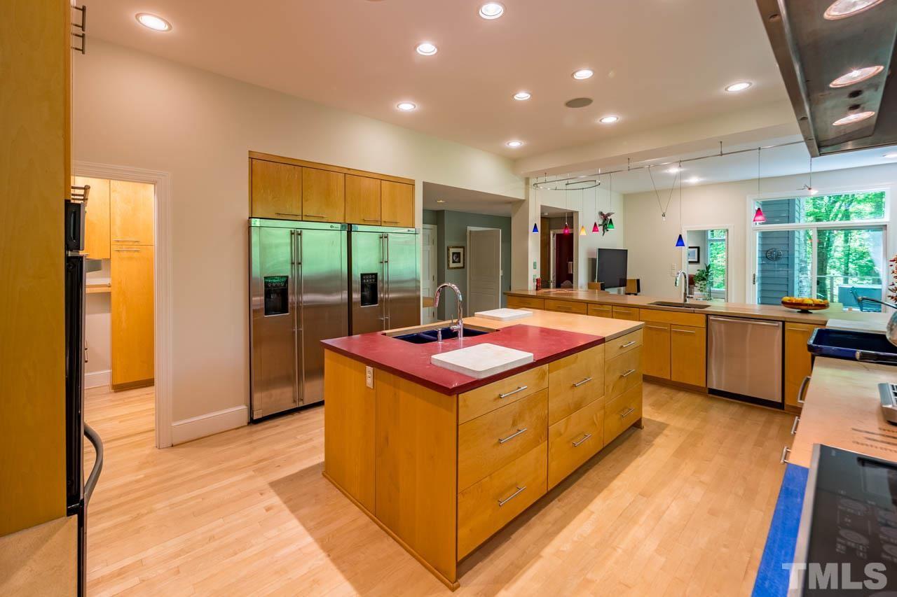 5415 Taproot Lane Durham, NC 27705 - Photo 12 of 30 a living room with furniture pool table and a large window