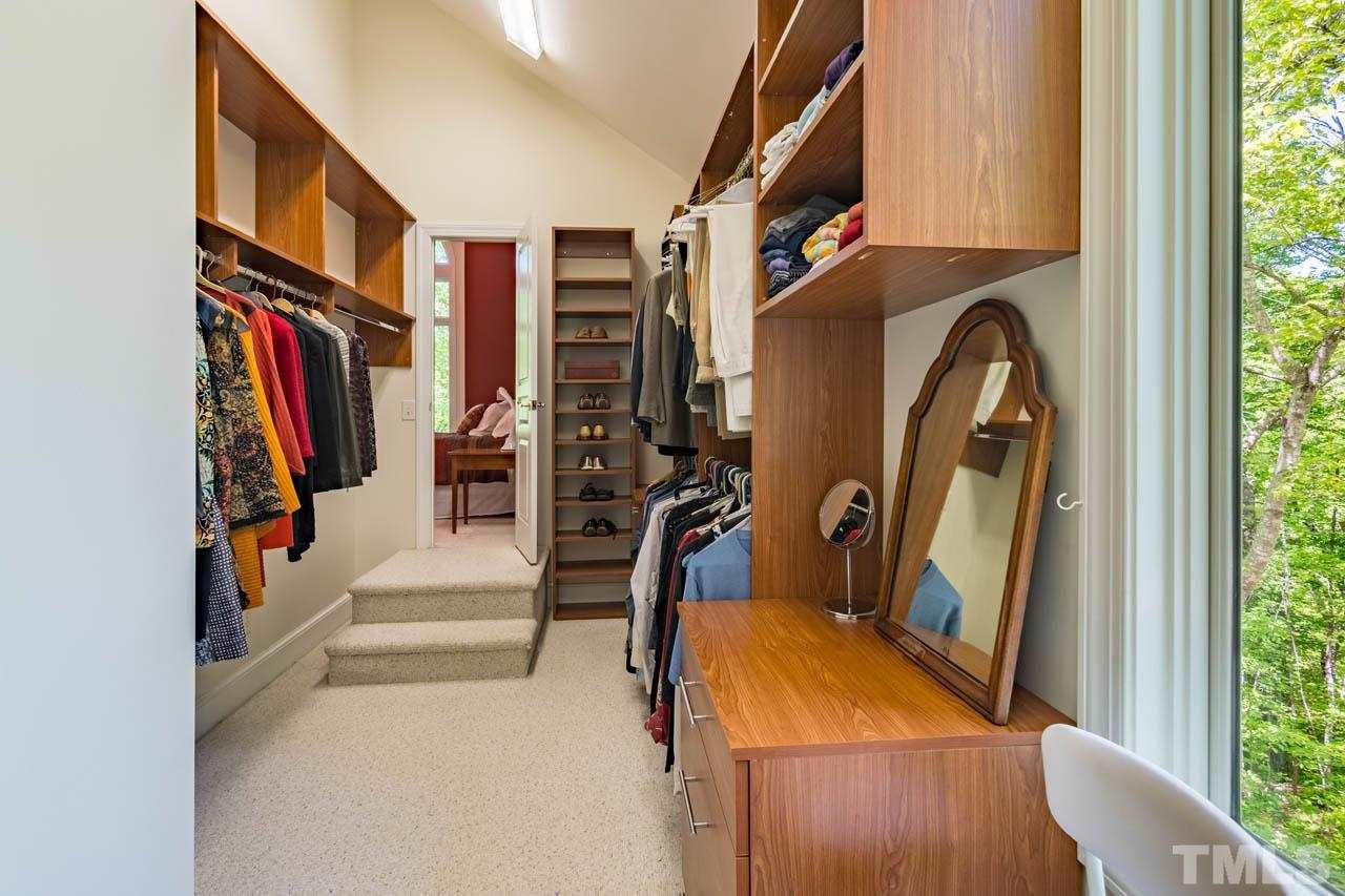 5415 Taproot Lane Durham, NC 27705 - Photo 20 of 30 a view of an entryway with wooden floor and a front door