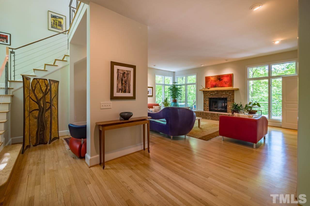 5415 Taproot Lane Durham, NC 27705 - Photo 3 of 30 a living room with furniture and a flat screen tv