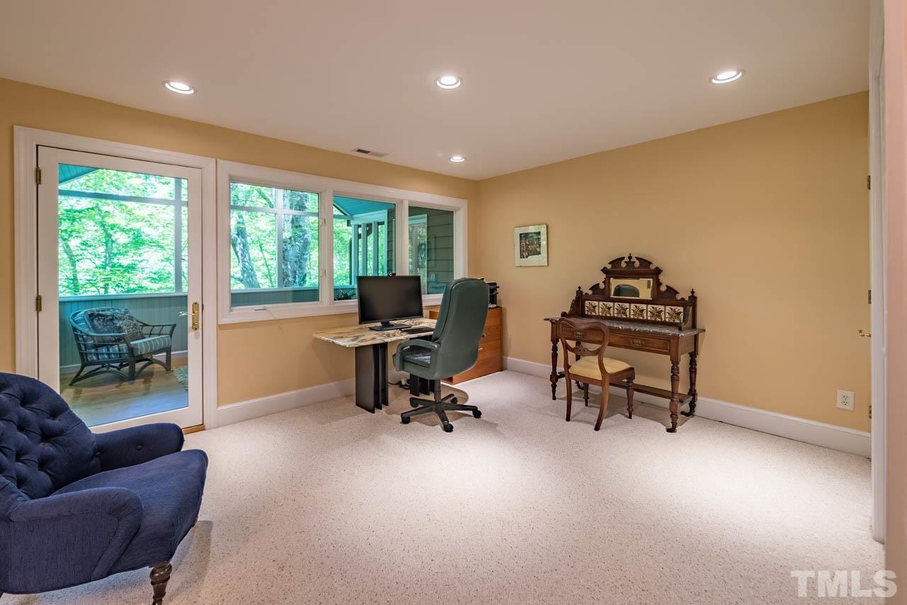5415 Taproot Lane Durham, NC 27705 - Photo 23 of 30 a view of a livingroom with workspace and a couch