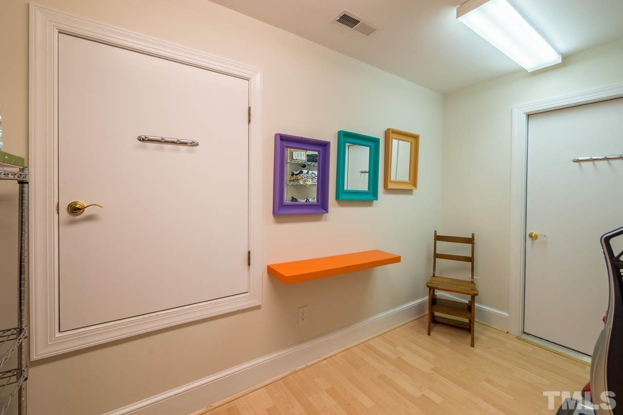 5415 Taproot Lane Durham, NC 27705 - Photo 28 of 30 a view of room with window and furniture