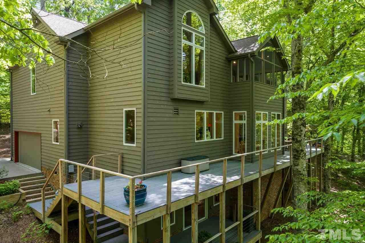 5415 Taproot Lane Durham, NC 27705 - Photo 29 of 30 a backyard of a house with lots of green space